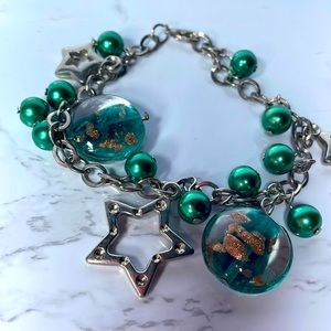 You’re A Star Charm bracelet with green beads, metal stars and large glass beads